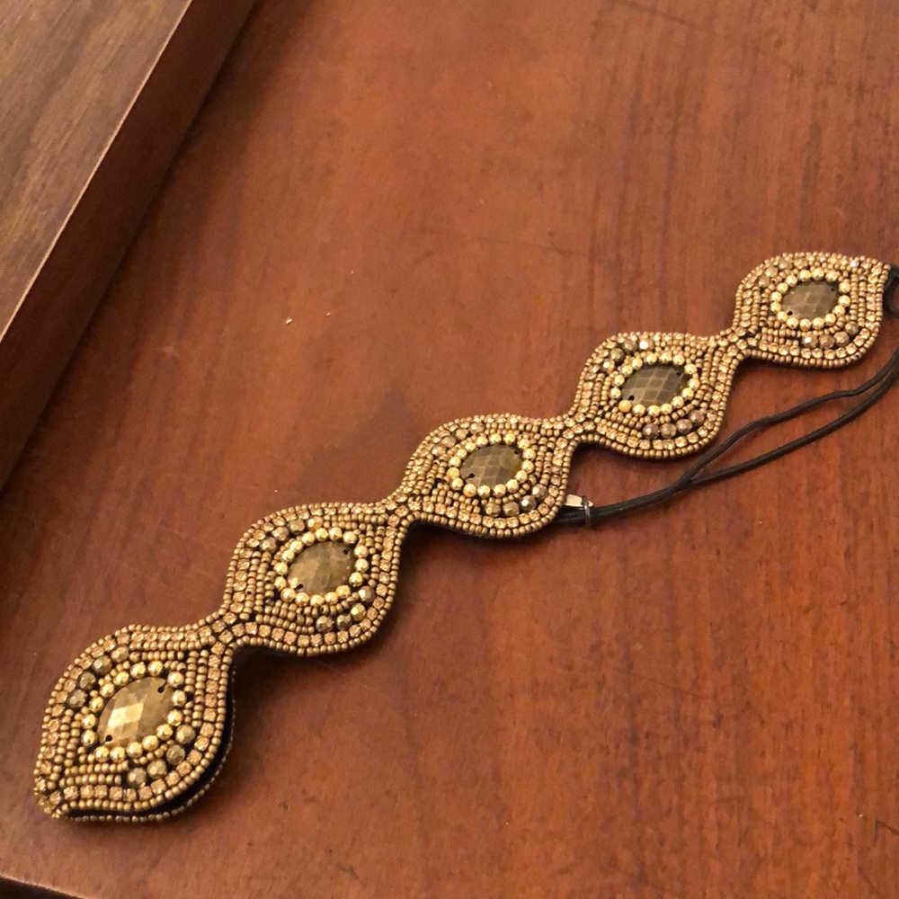 Pink Pewter headband. Worn once.